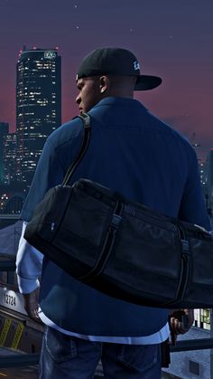 a man with a duffel bag looking at the city