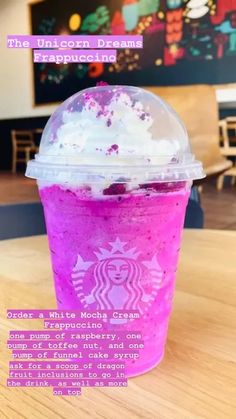 the unicorn dream frapplusure drink is pink and purple with white sprinkles