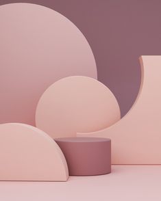 an abstract pink sculpture is shown against a purple background