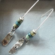 Turquoise Silver Earrings, Long earrings, Silver jewelry, Sterling silver Hammered silver Earrings are made out of sterling silver oxidized wire and Turquoise They are 2 inches long. Real colors may slightly differ from image on your screen, as it depends on your monitor settings. Processing time All of our jewelry are made to order. The time I need to prepare an order for shipping varies. For details, see individual items. Estimated shipping times: Europe: 3-7 business days North America: 7-14 Long Earrings Silver, Silver Earrings Long, Rectangular Earrings, Hammered Jewelry, Jewelry Sterling Silver, Green Earrings, Earrings Long, Turquoise Earrings, Gorgeous Earrings