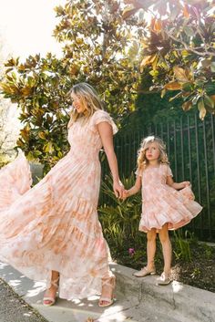 A daughter is a mother's gender partner, her closest ally in the family confederacy, an extension of her self. And mothers are their daughters' role model, have a lot of beautiful moments Mommy And Me Dresses Long Sleeve, Mom And Me Dresses, Ivy City Co Dresses, Peach Dresses, Ivy City Co, Summer Family Photos