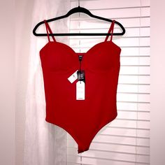 I Had To Order A Different Size So New With Tags. Color: Lipstick Red Size: Large Fitted Underwire Bodysuit With Straps, Red Fitted Swimwear With Spaghetti Straps, Fitted Red Swimwear With Straps, Red Sleeveless Lined Bodysuit, Red Push-up Bra With Padded Cups, Red Seamless Push-up Bra, Fitted Red Camisole With Built-in Bra, Red Corset With Built-in Bra, Red Stretch Camisole With Built-in Bra