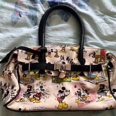 Disney Mickey And Minnie Comic Strip Bag Never Used So In Excellent Condition Multicolor Character Print Travel Bag, Disney Style Travel Shoulder Satchel Bag, Disney Satchel Bag For Everyday Use, Cute Mickey Mouse Bags For Travel, Black Disney Bags With Character Print, Minnie Mouse Multicolor Travel Bags, Cute Minnie Mouse Travel Bag, Multicolor Disney Bag With Mickey Mouse Design, Cute Mickey Mouse Bags For Disney Trips