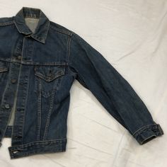 Vintage Levi’s Denim Jacket 1950s-1980s size: extra small measurements: armpit to armpit: 19” top of neck to bottom: 23” Vintage Levi's Dark Wash Outerwear, Vintage Levi's Medium Wash Denim Jacket, Levi's Vintage Medium Wash Denim Jacket, Levi's Vintage Denim Jacket In Medium Wash, Levi's Vintage Cotton Denim Jacket, Vintage Levi's Denim Outerwear, Levi's Vintage Long Sleeve Denim Jacket, Levi's Vintage Denim Outerwear, Levi's Vintage Denim Jacket For Spring