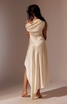 A draped off shoulder dress with an asymmetrical hem and a side slit. Toga Dress, Drapey Dress, Toga Party, Bias Cut Dress, Courthouse Wedding, Draped Dress, Asymmetrical Hem, Asymmetrical Dress, Dress For Women