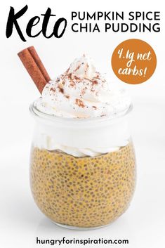 pumpkin spice chia pudding in a glass jar with cinnamon sticks and whipped cream on top