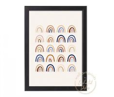 a framed art print with rainbows on it