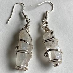 Angle Quartz Makes A Wonderful Stone For Gazing, Clearing The Mind & Meditation. Its Energy Is Often Described As Loving, Gentle & Elevating. Similar To Clear Quartz, Angle Quartz Is Also Considered An 'All-Healing' Crystal, Beneficial To All Charkas & Zodiac Signs. You Will Receive 1 Pair Of Wire Wrapped Crystal Earrings In The Color Of Your Choice Handmade With Love Each Pair Will Vary In Size As They Are Raw Materials! : Amethyst, Rose Quartz, Clear Quartz, Citrine, Selenite, Labradorite, Amm Smokey Quartz Jewelry, Angel Quartz, Raw Crystal Earrings, Mushroom Jewelry, Wire Wrapped Crystal, Bone Earrings, Wrapped Crystal, Southern Gothic, Raw Quartz