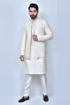 Cream prince coat with thread, sequin embroidery in checkered pattern. Paired with kurta and pant.
Components: 3
Pattern: Embroidery
Type Of Work: Thread, sequin, checkered
Neckline: Mandarin collar
Sleeve Type: Full sleeves
Fabric: Art Silk, Silk Blend
Color: Cream
Other Details: 
Front concealed button placket
Side pockets
Elasticated waistband
Occasion: Destination Wedding - Aza Fashions India Fashion Men, Indian Groom Dress, Prince Coat, Kurta Pajama Men, Kurta Set For Men, Cream Art, Tarun Tahiliani, Indian Groom, Sequin Embroidery