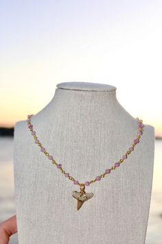 Pink Beaded Shark Tooth Necklace measuring about 15 inches with an 18K Gold Plated Lobster Claw Clasp & Extender and a lemon shark tooth wire wrapped on it!🦈 Beaded Shark, Lemon Shark, Shark Tooth Necklace, Tooth Necklace, Shark Tooth, Shark Teeth, Jacksonville Fl, Lobster Claw, Wire Wrapped