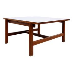 a wooden table with a white top on a white background