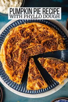 pumpkin pie with peyillo dough on a blue plate and serving utensils