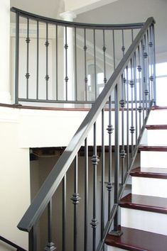 the stairs are made of metal and wood