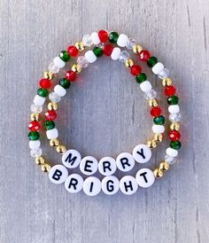 "Merry and Bright Mama & Mini Christmas Bracelet Set. Perfect for you and your little one to wear during the holidays!! ❄️❤️🎄 Crystal beads, seed beads and 18k gold ball beads with letter beads to spell out \"Merry\" & \"Bright\". Made with a clear elastic band. Words can be personalized to whatever you would like. * If you would like different words or a size that is not offered, please add in Personalization Section. CARING TIPS FOR YOUR JEWELRY ⭐️Treat and store with care. ⭐️ For longevity, avoid exposing your jewelry to water. ⭐️ Avoid having direct contact with lotions, perfumes, sanitizers as these chemicals may cause discoloration of your jewelry" Beaded Bracelets Sayings, Beaded Bracelets Seed Beads, Christmas Handmade Jewelry, Christmas Beaded Bracelet, Beaded Christmas Bracelets, Christmas Seed Bead Bracelets, Christmas Bead Bracelets, Diy Christmas Jewelry Ideas, Diy Christmas Bracelets