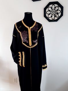 Premium quality handmade black crepe silk crepe Moroccan kaftan. This caftan is ideal for family occasions such as family celebrations, the month of Ramadan, Aid, or weddings. Several sizes available. It is also possible to personalize your caftan according to your taste, contact us for more information. Top quality black caftan, handy made. This caftan is ideal for family occasions such as family celebrations, the month of Ramadan, aid, or weddings. Several sizes available, it is possible to ha Black Kaftan For Eid, Traditional Black Agbada For Ceremonies, Black Long Sleeve Kaftan For Eid, Black Ceremonial Kaftan For Eid, Traditional Long Black Kaftan, Traditional Black Agbada With Dabka, Traditional Black Agbada With Dabka Detailing, Traditional Black Kaftan For Party, Traditional Black Party Kaftan