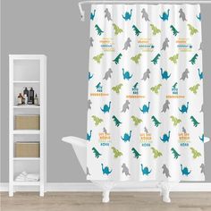 a shower curtain with dinosaurs printed on it