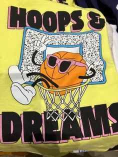 a t - shirt that says hoops and dreams on it with an image of a basketball going through the net