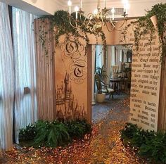 an entrance to a building with ivy growing on the walls, and a chandelier hanging from the ceiling