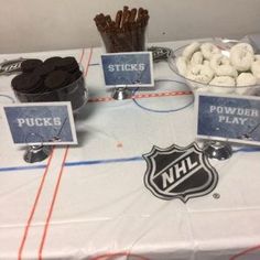 an ice hockey themed party with snacks and candies