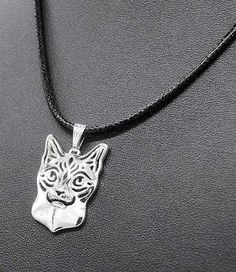 Zinc Alloy Black Cord of 17.7" with chain extension (approx) Pendant Size:  .63" X 1"  (approx) #Cat    #SiameseCat    #CatNecklace    #CatJewelry Mountain Jewelry, Cat Pendant Necklace, Cat Pendant, Cat Pendants, Cat Jewelry, Cat Necklace, Siamese Cats, Animal Jewelry, Silver Necklaces