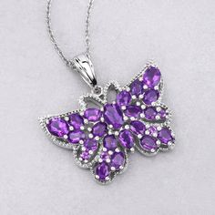 Introducing the exquisite Genuine Amethyst .925 Sterling Silver butterfly Pendant, a delicate fusion of elegance and charm. Crafted with precision and artistry, this pendant embodies timeless beauty and sophistication, making it a cherished addition to any jewelry collection. Luxury Amethyst Pendant Necklace, Luxury Large Amethyst Pendant Jewelry, Amethyst Pendant Gemstones With Accents, Collectible Amethyst Pendant Jewelry, Multi-stone Amethyst Pendant Jewelry, 18k Gold Jewelry, Aquamarine Jewelry, Silver Gemstone Jewelry, Swiss Blue Topaz