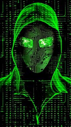 a person wearing a hoodie with green eyes in front of a computer circuit board