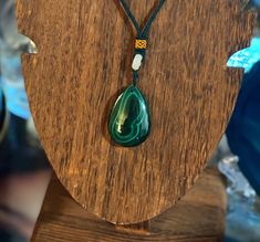 Beautiful large teardrop Malachite necklace. Polished stone with beautiful greens all through out. Malachite is a very powerful stone, great for protecting in the spiritual world, as well as manifestation energy. Spiritual Gemstone Teardrop Pendant Crystal Necklaces, Spiritual Teardrop Gemstone Crystal Necklace, Green Teardrop Gemstone Drop Necklace, Adjustable Green Crystal Necklaces For Meditation, Spiritual Agate Teardrop Pendant Jewelry, Teardrop Agate Jewelry For Healing, Spiritual Gemstone Teardrop Necklace, Spiritual Teardrop Gemstone Necklaces, Spiritual Teardrop Gemstone Necklace