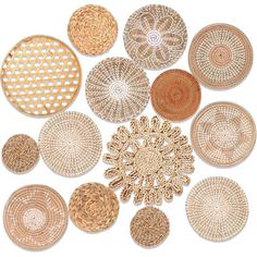 many woven baskets are arranged in rows on a white background, including one with circles and the other with dots