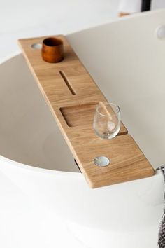 ★ Docking station for relaxing in the bathroom. A perfect gift for any occasion. A unique gift to a man or woman. On it you can place your favorite drinks and treats and of course your favorite gadget :)★ Made from premium natural wood.★ SizingShelf width - 7.2 inchesThickness 0.7 inchesThe width of the bathtub is from 28 to 41,7 inches / 70 to 106 cm (please specify when ordering)★ If you ordered a personal engraving - we will contact you within 1-2 days and show the pre- layout of engraving fo Bath Caddy Wooden, Bath Tray Caddy, Wood Bath Tray, Wood Bathtub, Bath Rack, Bath Board, Tub Tray, Rustic Bath, Bathtub Caddy