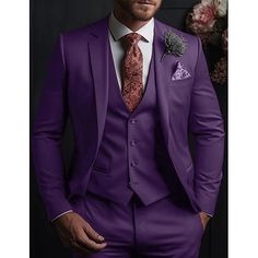 a man wearing a purple suit and tie