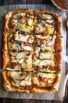 an image of a pizza with cheese and vegetables on the top, ready to be eaten