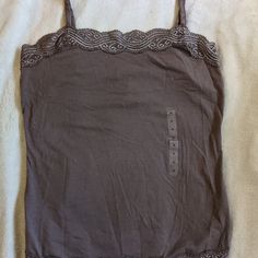 Great Condition, New With Tags, Never Worn. Size Women's Small. Cami Camisole Top Shirt Tank Spaghetti Strap Straps Lacy Junior Girl Girls Woman Women Fitted Lace Trim Camisole Tank Top, Cheap Brown Camisole Top, Vintage Spaghetti Strap Tank Top With Lace Trim, Brown Lace Top, Lacy Camisole, Fitted Purple Cotton Camisole, Purple Cotton Camisole Top, Brown Lacy Tank Top, Brown Cami Tank Top With Built-in Bra