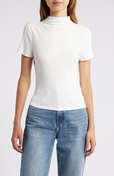 Made from soft and stretchy jersey, this figure-hugging top has a chic mock neck that elevates the look of any outfit. 20 1/2" length (size Medium) Mock neck Short sleeves 95% modal, 5% spandex Dry clean or machine wash, dry flat Imported Rib Top, Neck Stretches, Build A Wardrobe, Favorite Daughter, Maternity Shops, Blazer With Jeans, Designer Clothes For Men, Modern Outfits, Women's Summer Fashion