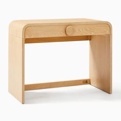 a small wooden desk with one drawer open