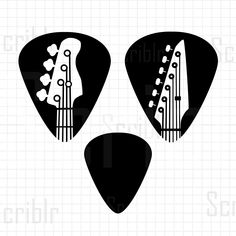 two guitar picks with hearts on them