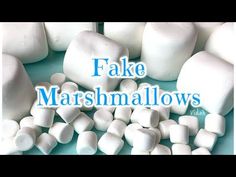 fake marshmallows are piled on top of each other with the words fake marshmallows