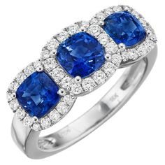 three stone ring with blue sapphires and diamonds