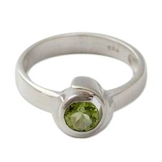 Calm and cool peridot evokes a sparkling sea of green where love can flourish. This modern casual ring from Bhavesh is fashioned of sterling silver. .925 Sterling silver Elegant Green Peridot Stackable Rings, Lime Green Sterling Silver Rings As Gift, Lime Green Sterling Silver Rings For Gift, Green Peridot Stackable Promise Rings, Green Ring With Bezel Setting And Round Stone, Green Peridot Stackable Rings, Round Peridot Rings For Gifts, Peridot Bezel Setting Promise Ring, Peridot Promise Ring With Bezel Setting