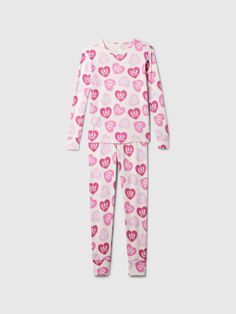 Soft organic cotton pajama set with a cozy brushed interior.  Crewneck.  Long sleeves.  Elasticized waist at PJ pants.  Allover Gap x Barbie heart graphics.  Made with 100% organically grown cotton, which is grown without the use of synthetic pesticides and fertilizers.  This product was made in a factory that runs the Gap Inc.  P. A. C. E.  Personal Advancement & Career Enhancement) program.  P. A. C. E.  is our educational program that helps the women who make our clothes build the skills, kno Heart Graphics, Cotton Pajama Set, Lavender Nails, Mouse Print, Cotton Pajama Sets, Pj Pants, Cotton Pyjamas, Girls Pajamas, Work Life