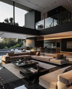 a modern living room with high ceilings and large glass windows overlooking the pool in the background