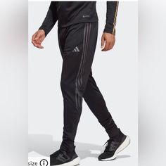 Take Your Soccer Style Beyond The Touchline. Thanks To Those Signature Tapered Legs, These Adidas Tiro Pants Need No Introduction. Born On The Training Ground, They Feature Ankle Zips For Easy On And Off And Moisture-Managing Aeroready For Comfortable Movement. Zip Pockets Offer Secure Storage For Your Everyday Essentials. Made With 100% Recycled Materials, This Product Represents Just One Of Our Solutions To Help End Plastic Waste. Adidas Fitted Jogging Bottoms, Adidas Black Training Joggers, Adidas Black Joggers For Training, Black Tapered Leg Pants For Jogging, Adidas Black Training Bottoms, Adidas Black Full Length Bottoms, Adidas Black Sportswear Bottoms, Adidas Tiro Pants, Soccer Style