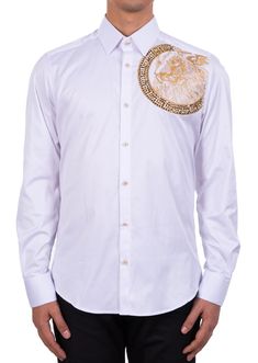 Limited edition- One of a kind Eye-catching studded rhinestone detailed shirt. A modern shirt with an unexpected edge. This white cotton shirt from Mondo is embellished with gold rhinestone. Looking sharp. Your style status can’t be messed with, and this shirt from Mondo makes that clear. Adorned with gold-tone rhinestones, this piece will toughen up any casual look. Eye-catching rhinestone details French placket Point collar Custom buttons Sleeves with Cufflinks Long sleeves with mitered Back y White Long Sleeve Embellished Shirt, White Embellished Long Sleeve Shirt, Designer Embellished Cotton Shirt, Rhinestone Shirt, White Cotton Shirt, Rhinestone Shirts, Custom Buttons, Gold Rhinestone, White Cotton