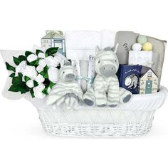 a white basket filled with lots of baby items