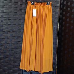 Nwt. Mustard Yellow. Pleated Maxi Skirt, By Lumie. Lightweight And Flowy Polyester, With Lining, Perfect For Spring And Summer. Xs, With Generous Elastic Waistband. Chic Yellow Pleated Bottoms, Chic Yellow Skirt With Elastic Waistband, Yellow Pleated Long Skirt, Yellow Stretch Maxi Skirt For Spring, Spring Stretch Yellow Maxi Skirt, Spring Yellow Pleated Bottoms, Summer Yellow Flowy Pleated Skirt, Yellow Stretch Skirt For Fall, Yellow Flowy Pleated Skirt For Summer