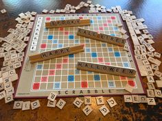 scrabble tiles spelling out spooky words on a table