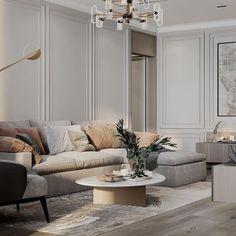 a living room filled with furniture and a chandelier