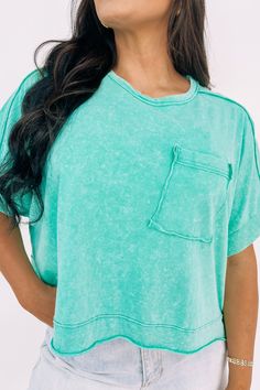 This oversized crop top features a round neckline, short sleeve, dolman sleeve, drop shoulder, patch pocket, oversized crop fit, exposed hem detailing, and mineral washed. 100% Cotton Machine Wash Cold. With Like Colors. Gentle Cycle. Do Not Bleach. Do Not Tumble Dry. Hang Dry. Low Iron. Dry Clean For Best Results. Bethany is 5'10 wearing a size Medium. Acid Wash Cropped Top Relaxed Fit, Acid Wash Relaxed Fit Cropped Tops, Casual Green Top With Side Pockets, Casual Green Tops With Side Pockets, Acid Wash Short Sleeve Tops With Frayed Hem, Casual Soft-washed Cropped T-shirt For Spring, Acid Wash Cropped T-shirt For Spring, Short Sleeve Tops With Frayed Hem For Loungewear, Relaxed Short Sleeve Tops With Frayed Hem