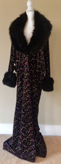 *Available for immediate shipping* Handmade,velvet cocoon robe, faux fur collar and cuffs. Old Hollywood glamour for the modern Diva , this gorgeous robe is made from a beautiful black velvet embossed with glitter pattern and a luxuriant generous midnite black faux fur trim on the collar and cuffs . Hook and eye front closure. For the diva who knows how to make an entrance! Fits up to size 18 and super flattering on all bodies! Party Fur Coat With Feather Trim, Party Fur Coat With Faux Fur Trim, Glamorous Long Sleeve Fur Coat For Party, Velvet Outerwear For Costume, Winter Velvet Costume Outerwear, Winter Velvet Outerwear, Black Fur Coat With Faux Fur Trim For Party, Glitter Pattern, Old Hollywood Style