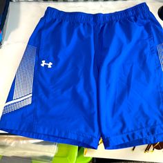 Great Shorts. Very Sleek Looking. Cool White Pattern On Sides. Drawstring. Large Pockets. Nwot Under Armour Blue Shorts For Summer, Blue Under Armour Summer Shorts, Under Armour Blue Bottoms For Summer, Under Armour Summer Blue Bottoms, Under Armour Shorts, Shorts Men, Athletic Performance, Gym Shorts, Sweat Shorts