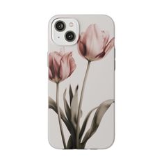 an iphone case with two pink flowers on the front and back cover, in black and white